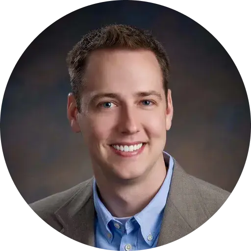 Author with 'Act Well Feel Well' book